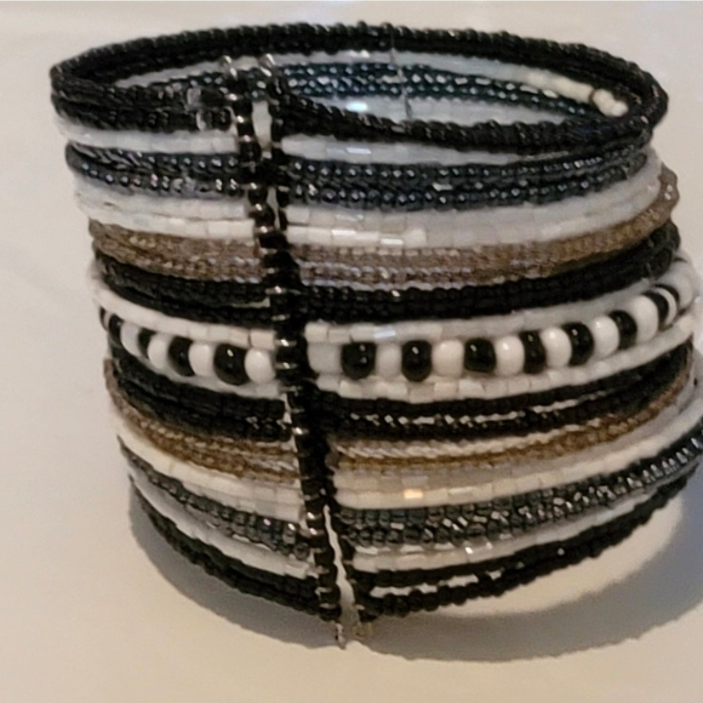 Black and white bracelet 1 that looks like many cuff