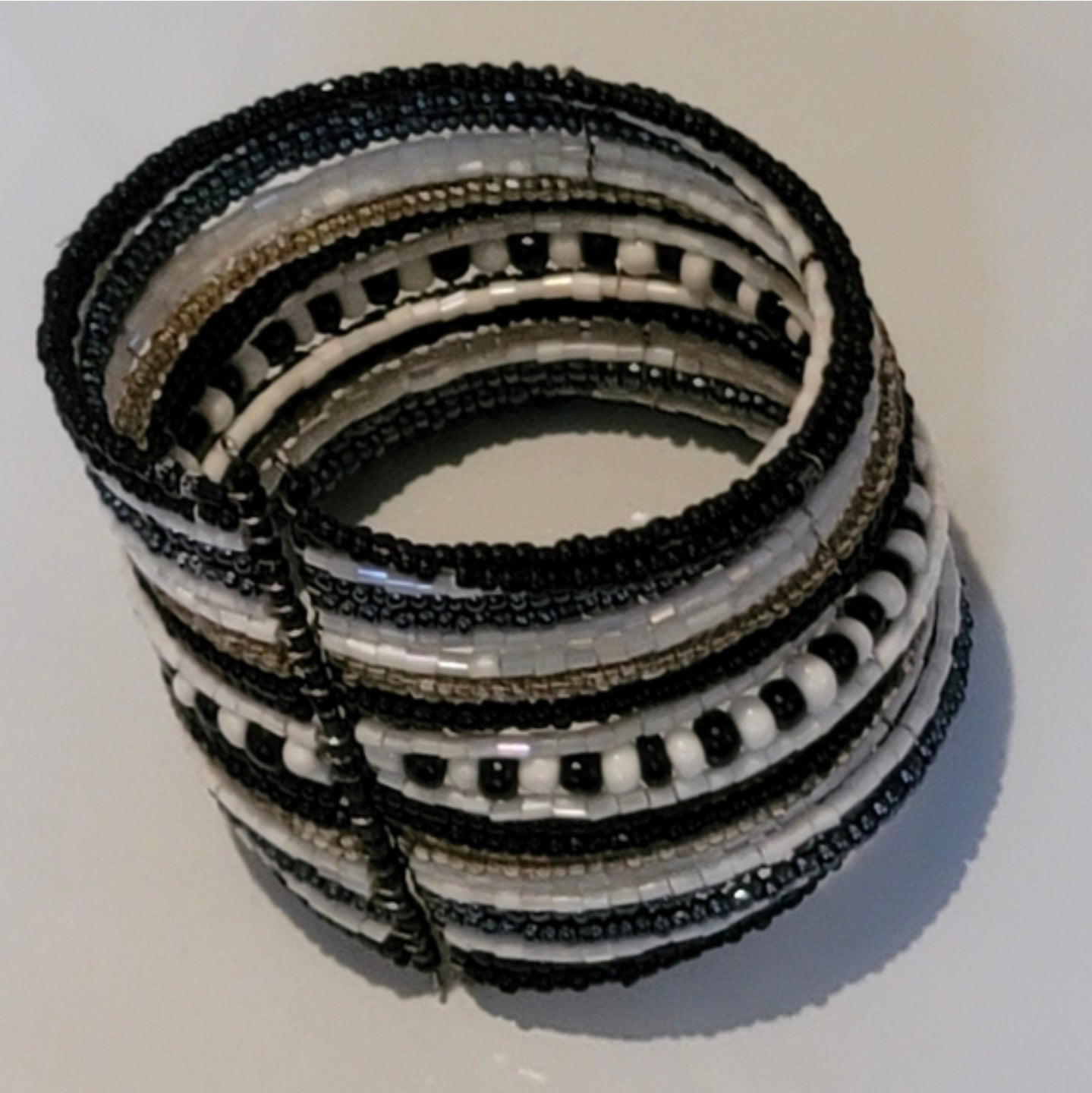 Black and white bracelet 1 that looks like many cuff
