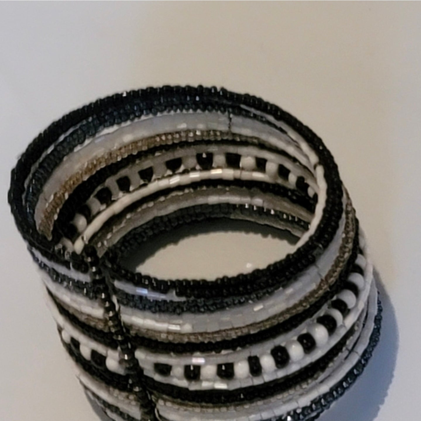Black and white bracelet 1 that looks like many cuff