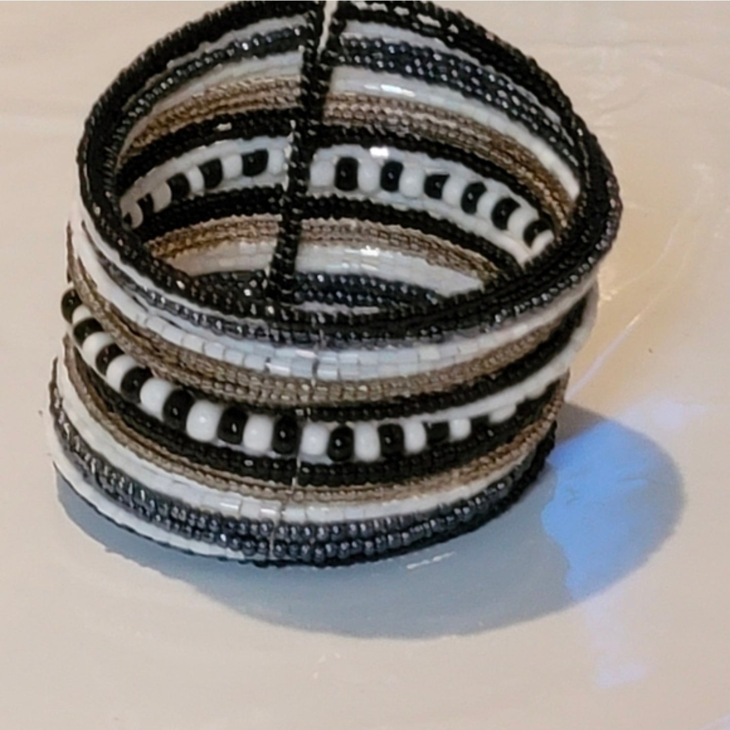 Black and white bracelet 1 that looks like many cuff